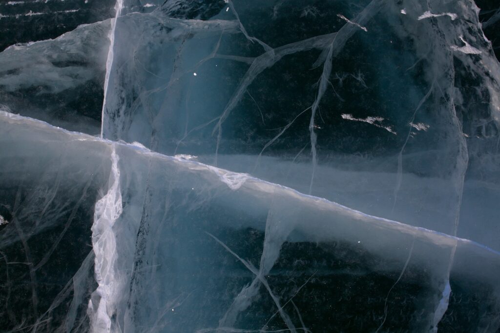 A stunning frozen lake in the Northwest Territories, showcasing the captivating winter beauty of the region